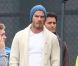 David et Victoria Beckham tendres et complices durant un match de leurs enfants