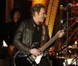 Johnny Hallyday, lors de l'enregistrement de son concert privé à la Tour Eiffel, le samedi 3 décembre 2011.