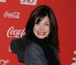 Delphine Chanéac lors d'une soirée au profit de l'association Petits  Princes et de  lancement du train rouge Coca Cola, le 15 décembre 2011, à  Paris