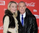 Jean-Claude Jitrois et Sarah Marshall lors d'une soirée au profit de l'association Petits  Princes et de  lancement du train rouge Coca Cola, le 15 décembre 2011, à  Paris