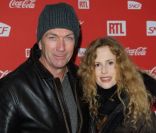 Philippe Caroit et Florence Darel lors d'une soirée au profit de l'association Petits  Princes et de  lancement du train rouge Coca Cola, le 15 décembre 2011, à  Paris