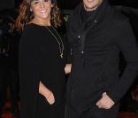 Merwan Rim et sa femme Bérangère sur le tapis rouge de la 13e édition des NRJ Music Awards, au palais des festivals de Cannes, le 28 janvier 2012.