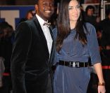 Corneille et son épouse Sofia, 'les inséparables', sur le tapis rouge de la 13e édition des NRJ Music Awards, au palais des festivals de Cannes, le 28 janvier 2012.