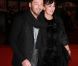 Christophe Maé et sa femme Nadège ont quitté leur repaire pour apparaître sur le tapis rouge de la 13e édition des NRJ Music Awards, au palais des festivals de Cannes, le 28 janvier 2012.