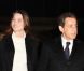 Carla Bruni et Nicolas Sarkozy arrivent dans les locaux de TF1 où le président annoncera sa candidature sur le plateau du JT, le 15 février 2012.