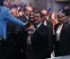 Carla Bruni-Sarkozy et Nicolas Sarkozy fendent la foule réunie au Parc Chanot à Marseille, le 19 février 2012.