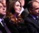 Carla Bruni-Sarkozy, entre François Fillon et Jean-François Copé, au grand meeting marseillais de Nicolas Sarkozy, le 19 février 2012.