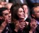 Carla Bruni-Sarkozy, entre François Fillon et Jean-François Copé, au grand meeting marseillais de Nicolas Sarkozy, le 19 février 2012.