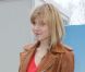 Clémence Poésy arborait un perfecto camel, un sac et des bottes Balenciaga lors du défilé de la marque à Paris, le 1er mars 2012.