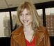 Clémence Poésy, souriante et stylée au défilé Balenciaga à Paris, le 1er mars 2012.
