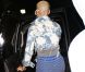 Amber Rose et son fiancé Wiz Khalifa sortent d'un concert des Guns N' Roses à Los Angeles le 12 mars 2012
