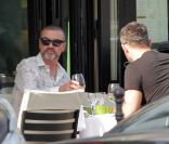 George Michael et son petit ami Fadi Fawaz le 23 mars 2012 à Paris