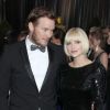 Anna Faris et son mari Chris Pratt posent lors de la cérémonie des Oscars en février 2012