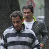 Nicolas Sarkozy a pris la pluie durant son premier footing de citoyen presque lambda, au bois de Boulogne, le 15 mai 2012.
