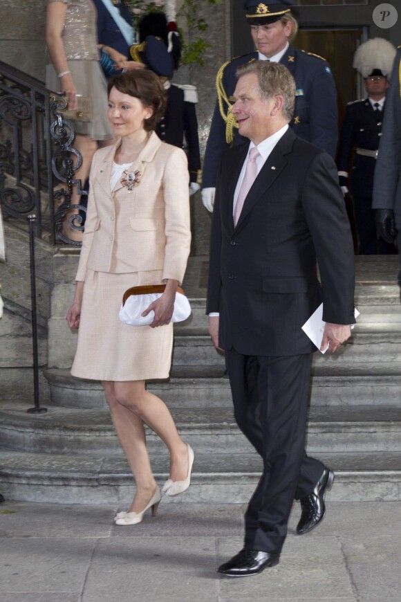Le couple présidentiel de Finlande. Baptême de la princesse Estelle de Suède, fille de la princesse Victoria et du prince Daniel, le 22 mai 2012 en la chapelle royale du palais Drottningholm, à Stockholm.