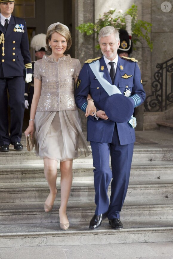 Philippe et Mathilde de Belgique. Baptême de la princesse Estelle de Suède, fille de la princesse Victoria et du prince Daniel, le 22 mai 2012 en la chapelle royale du palais Drottningholm, à Stockholm.