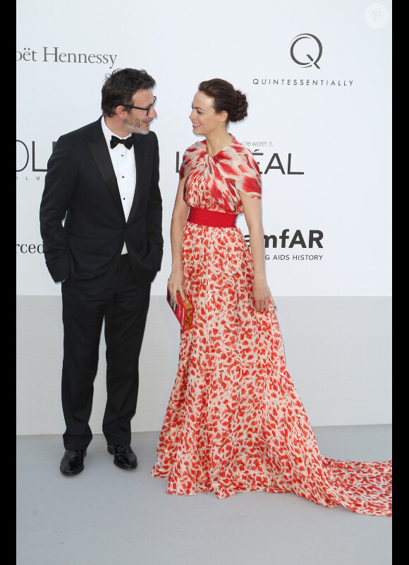Bérénice Bejo et Michel Hazanavicius arrivent à l'amfAR, le 24 mai 2012 au Festival de Cannes.
