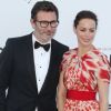 Le couple Bérénice Bejo et Michel Hazanavicius arrivent à l'amfAR, le 24 mai 2012 au Festival de Cannes.