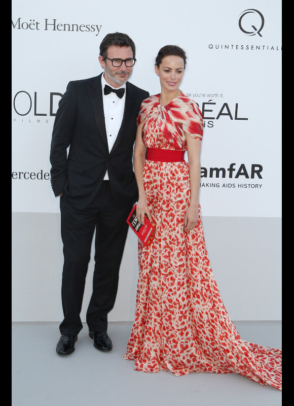 Le couple Bérénice Bejo et Michel Hazanavicius arrivent à l'amfAR, le 24 mai 2012 au Festival de Cannes.