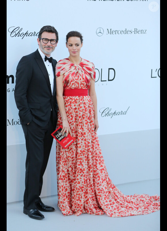 Bérénice Bejo et Michel Hazanavicius arrivent à l'amfAR, le 24 mai 2012 au Festival de Cannes.