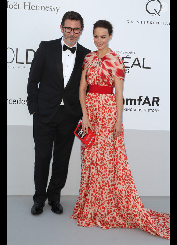 Bérénice Bejo et Michel Hazanavicius arrivent à l'amfAR, le 24 mai 2012 au Festival de Cannes.