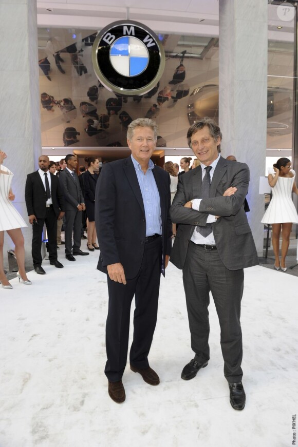 Pierre Dhostel et Nicolas de Tavernost à l'inauguration du concept store BMW de l'avenue George-V, à Paris, le 23 mai 2012.