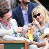 Michael Madsen et son épouse Deanna lors de la demi-finale hommes du tournoi de tennis de Roland Garros le vendredi 8 juin 2012