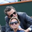  Anne-Sophie Lapix et son mari Arthur Sadoun lors de la demi-finale hommes le vendredi 8 juin 2012 à Roland Garros  