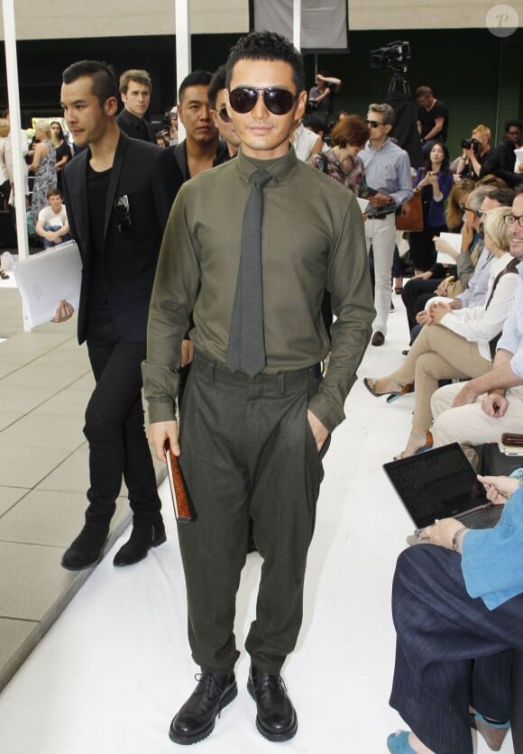 L'acteur chinois Huang Xiaoming au défilé Dior Homme Printemps-Eté 2013 au Tennis Club de Paris, le 30 juin 2012.