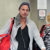 Jason Trawick arrive à l'aéroport de Maui à Hawaï, en famille, le dimanche 1er juillet 2012.