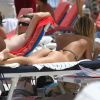 Candice Swanepoel se prélasse sous le soleil de Miami. Le 3 juillet 2012