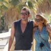 Rafael van der Vaart et sa femme Sylvie dans les rues de Marbella profitent du soleil de la cité balnéaire le 10 juillet 2012
