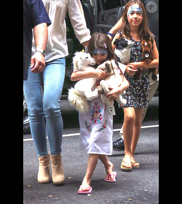Katie Holmes et Suri Cruise, toujours aussi complices, à New York le 13 juillet 2012