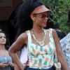 Rihanna, sexy dans sa combinaison Topshop, fait du shopping dans les boutiques de luxe de Porto Cervo avec sa meilleure amie Melissa Forde. Le 17 juillet 2012.