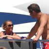 Sébastien Loeb et sa femme Séverine en vacances dans le port de Saint-Tropez le 23 juillet 2012