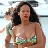 Rihanna, sexy et cheveux au vent, touche terre à Saint-Tropez pour un après-midi shopping. Le 23 juillet 2012.