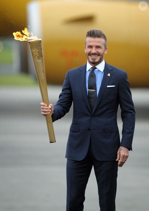 David Beckham, fier relayeur de la flamme olympique à Londres, le 18 mai 2012.