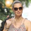 Heidi Klum, dans une petite robe, se balade à New York le 11 août 2012