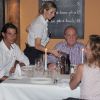 Rafael Nadal, avec sa compagne Xisca Perello, était l'invité du roi Juan Carlos Ier d'Espagne le 10 août 2012 au restaurant Flanigan, à Majorque.