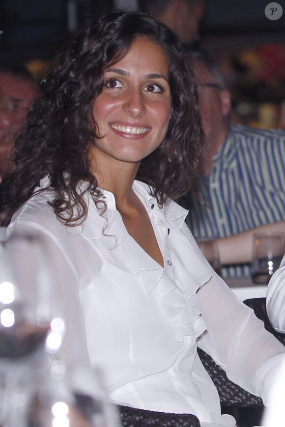 Maria Francisca Perello, chérie de longue date de Rafa. Rafael Nadal, avec sa compagne Xisca Perello, était l'invité du roi Juan Carlos Ier d'Espagne le 10 août 2012 au restaurant Flanigan, à Majorque.