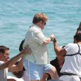  Elton John et son mari David Furnish arrivent au Club 55 de Saint-Tropez avec quelques amis le 13 août 2012 