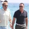Elton John et son mari David Furnish s'offrent quelques jours à Saint-Tropez et commencent par un petit tour au Club 55 le 13 août 2012