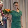 La princesse Victoria de Suède superbe en vert lors de la remise du Prix Hermes pour l'exportation, le 30 août 2012 à la Chambre de Commerce de Stockholm.