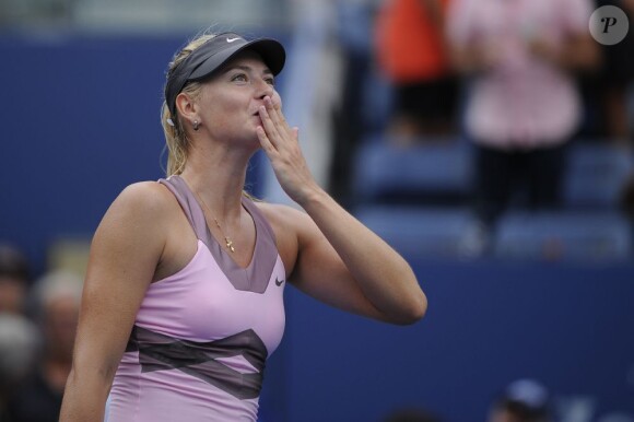 Marion Bartoli a livré un dur combat face à Maria Sharapova mais s'est finalement inclinée en quart de finale de l'US Open le 5 septembre 2012 à New York