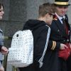 Un nouveau sac MCM pour le chanteur Justin Bieber repéré à la sortie du Royal Garden Hotel à Londres, habillé d'une veste et d'un jogging Adidas et de baskets Supra. Le 26 avril 2012.