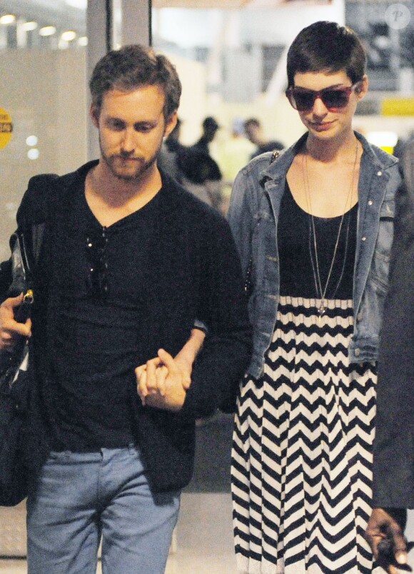Actress Anne Hathaway and her boyfriend Adam Shulman arriving at JFK Airport in New York City, NY, USA on July 31, 2012. Photo by Humberto Carreno/Startraks/ABACAPRESS.COM01/08/2012 - New York City