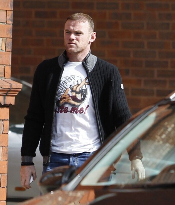 Wayne Rooney à la sortie d'un hôtel de Manchester le 19 septembre 2012