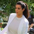 Kim Kardashian, maîtresse irréprochable de Mercy, son chat qu'elle emmène chez Orange Grooming pour une petite séance de soins. Miami, le 15 octobre 2012.
