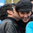 Melissa Theuriau et Jamel Debbouze, toujours plus complices et amoureux, lors de l'opération Poussettes vides au profil de l'Unicef à Paris dans les jardins du Trocadéro le 18 novembre 2012