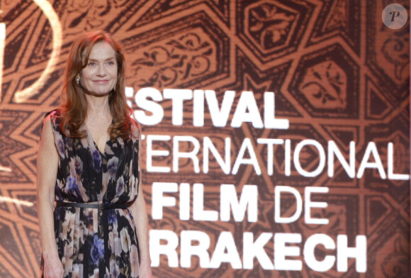 Isabelle Huppert, resplendissante, durant l'ouverture du Festival International du Film de Marrakech 2012, le 30 Novembre 2012.